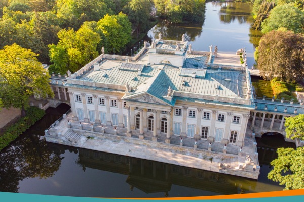 Aerial view of the Palace on the Isle surrounded by water in Royal Łazienki Park, Warsaw