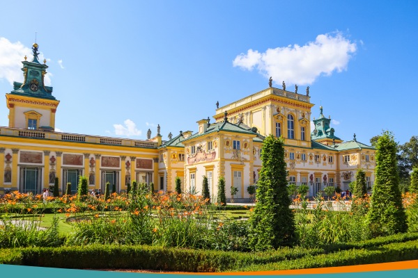 Wilanów Palace in Warsaw, a 17th-century Baroque royal residence with formal gardens in the foreground